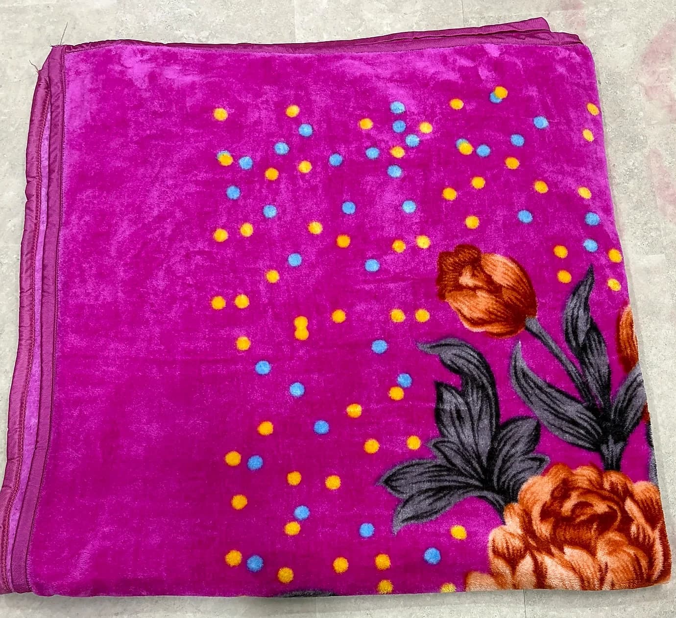 Vibrant hot pink floral plush mink blanket spread with floral medallion