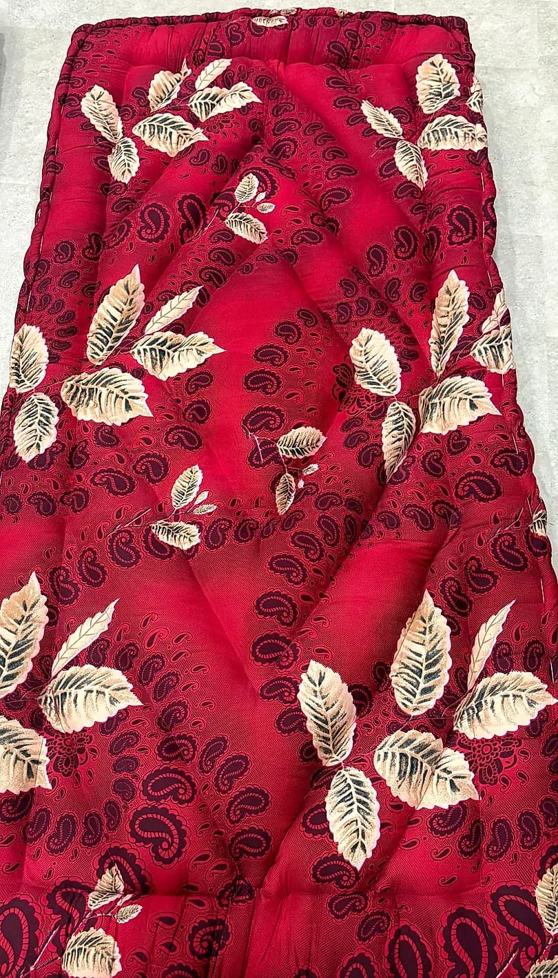Rich crimson floral paisley printed seasonal winter mattress or floor gadda